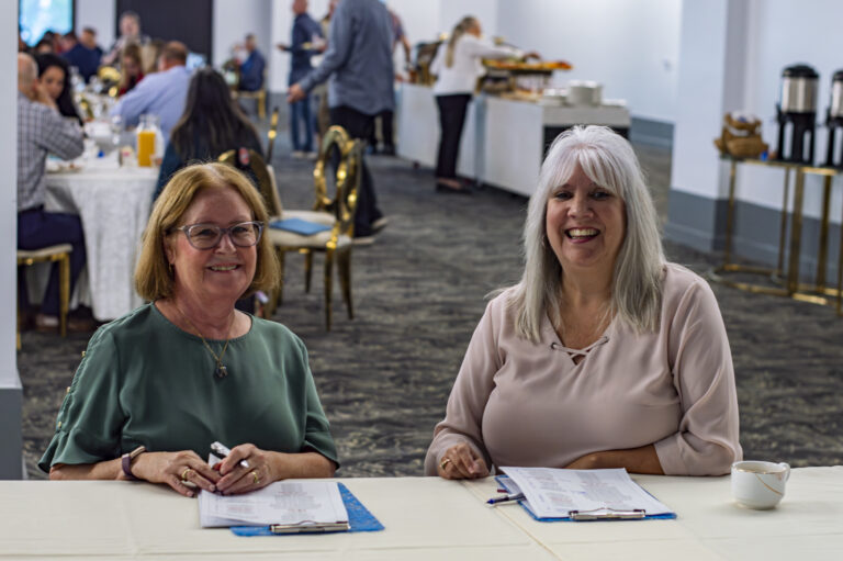 Volunteers at the check-in table.